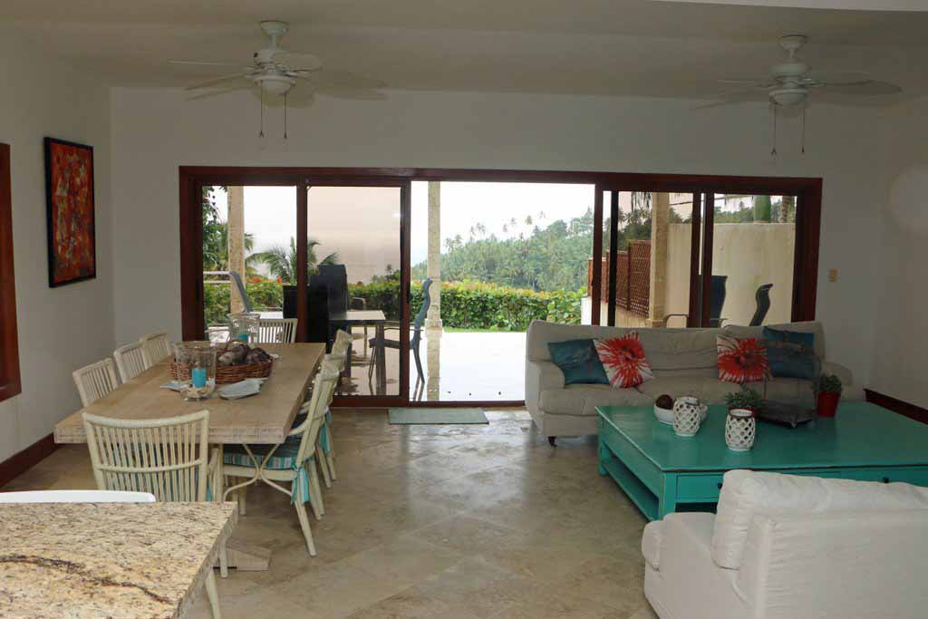 puerto-bahia-villa-montana-for-sale-living-area-access-to-the-pool-view